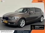 BMW 1-serie 118i High Executive Navigatie Airco Cruise contr, Auto's, BMW, Euro 6, 4 cilinders, Bruin, Leder