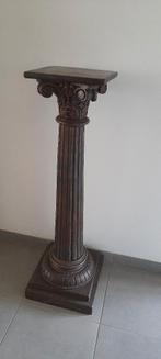 Grote houten zuil, Enlèvement