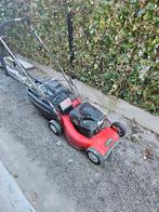 Grasmaaier op benzine, Enlèvement