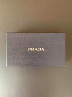 portefeuille ou pochette Prada - Nouveau -, Enlèvement