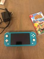Nintendo switch lite met lader en spel, Comme neuf, Enlèvement, Turquoise