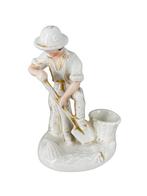 19e-eeuwse porseleinen inktpot-plumier "Man met een schop"