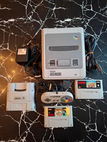 Super Nintendo-console + 2 spellen + Super Gameboy enz...  beschikbaar voor biedingen