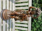 Bronzen beeld, Ophalen