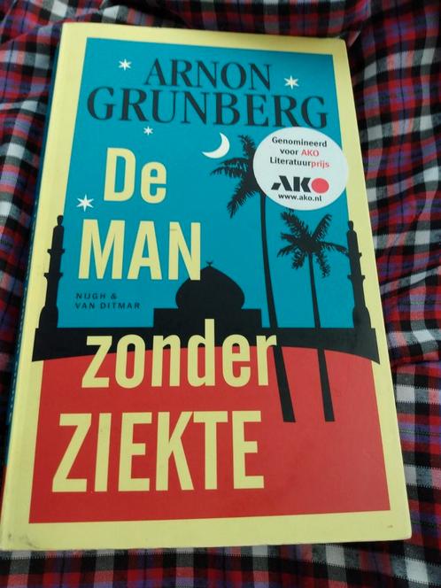 Arnon Grunberg - De man zonder ziekte, Boeken, Literatuur, Zo goed als nieuw, Ophalen of Verzenden