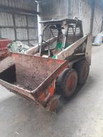 Bobcat met grondbak, mestriek en aanbouwkoppeling, Ophalen