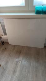 Spatplaat voor achter kookplaat, Ophalen