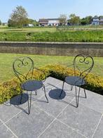 Ijzeren tuinstoelen, Ophalen