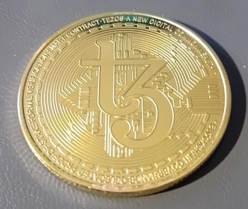 fysieke cryptomunt Tezos beschikbaar voor biedingen