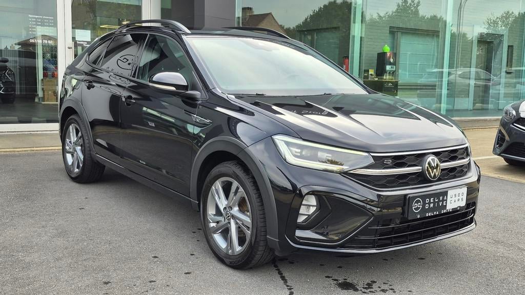 Volkswagen Taigo 1.5 TSI ACT R-LINE DCT7, Auto's, Volkswagen, Stof, 4 cilinders, Zwart, Bedrijf