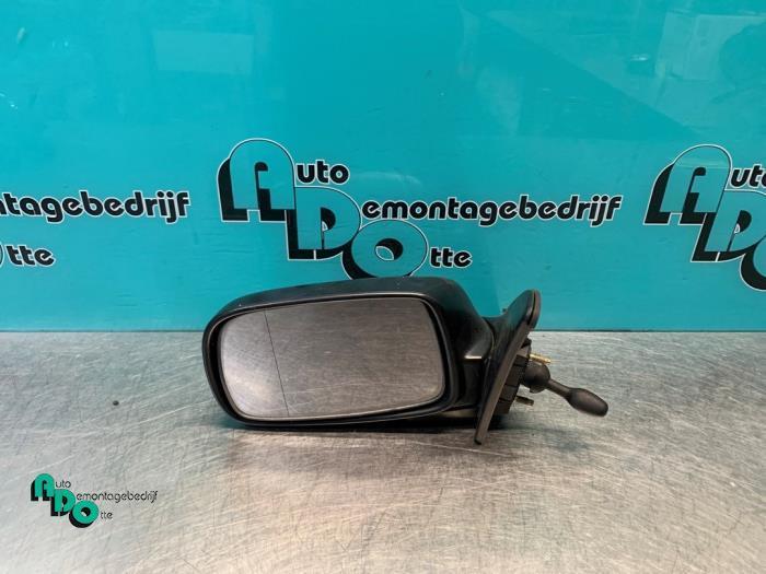 Buitenspiegel links van een Toyota Corolla (Corolla 96-), Auto-onderdelen, Spiegels, Toyota, Gebruikt, 3 maanden garantie, Ophalen of Verzenden