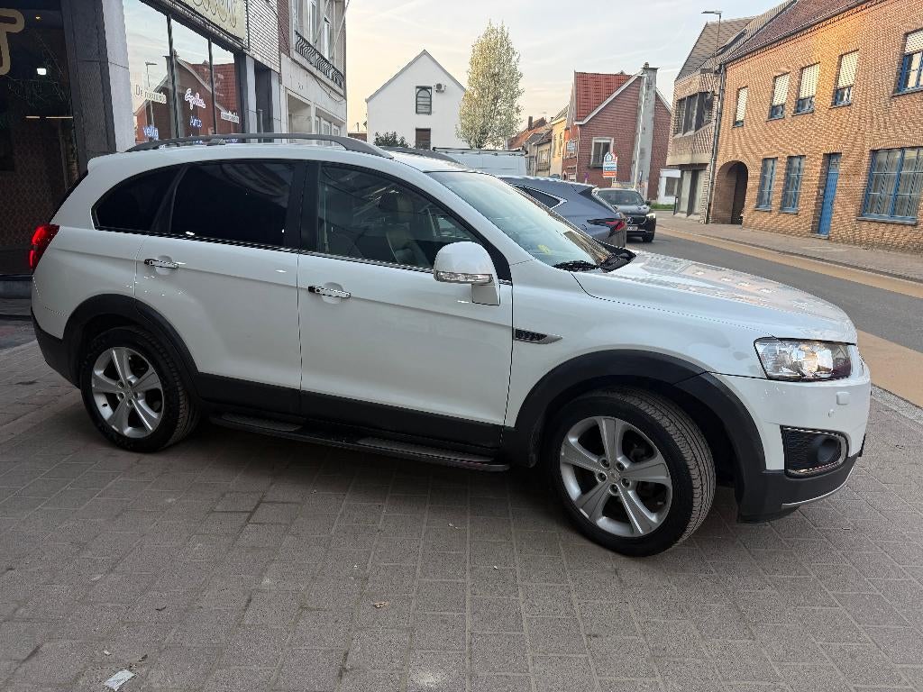 Chevrole Captiva 2.2Cdti 7Place 4x4 *1er Main car pass*, Auto's, Chevrolet, Euro 5, Zwart, Wit, Bedrijf