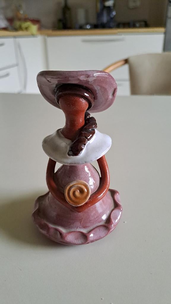 Dame in keramiek, Ophalen