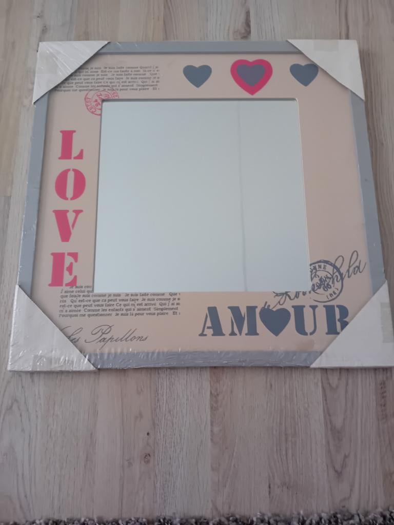 Nieuwe spiegel met tekst, Ophalen