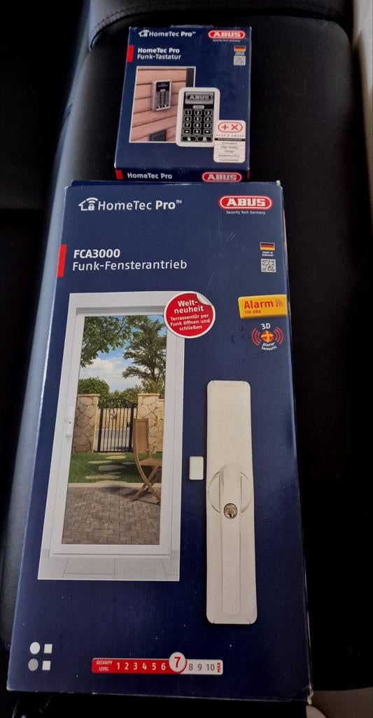 HomeTec Pro  draadloze raamaandrijving ABUS  (nieuwstaat), Ophalen of Verzenden, Zo goed als nieuw