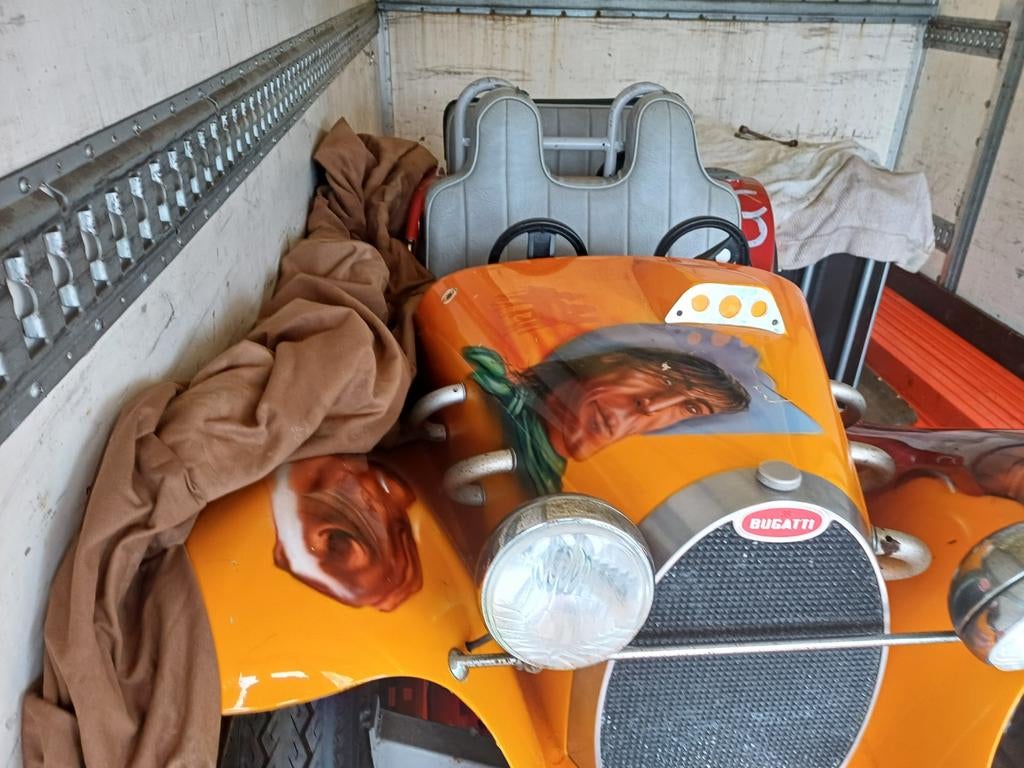 Auto van op draaimolen, Ophalen