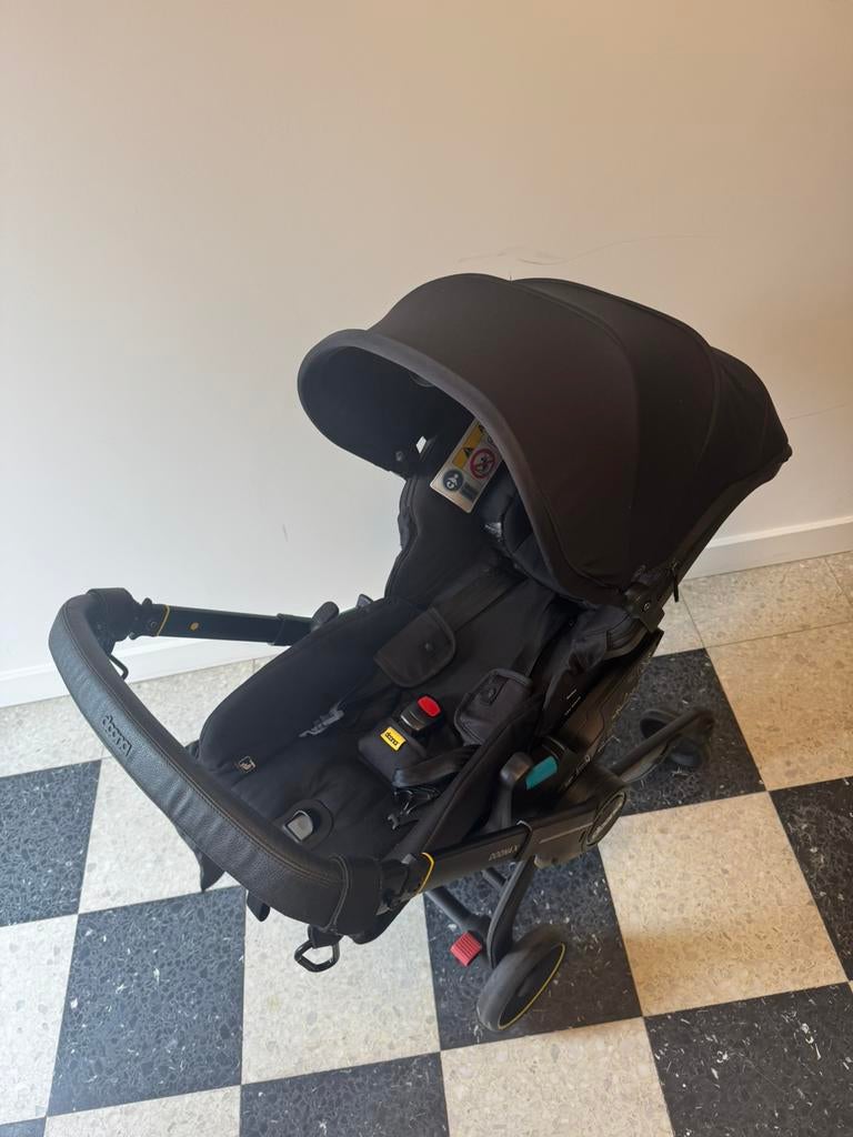 Doona X, Ophalen, Zo goed als nieuw, Regenhoes