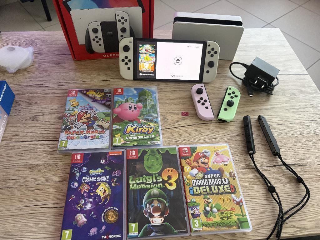 Nintendo Switch Oled met spellen en accessoires, Switch OLED, Met 2 controllers, Ophalen of Verzenden, Gebruikt