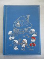 Très beau livre  Les schtroumpfs tome 1, Gelezen, Peyo, Ophalen of Verzenden, Meerdere stripboeken