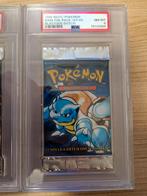 Blastoise Base Set Booster Pack PSA 8 1st edition Dutch NL, Enlèvement ou Envoi, Neuf, Booster