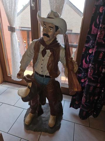 Beeld cowboy met geweer beschikbaar voor biedingen