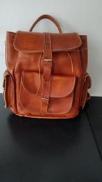 Lederen rugzak, Ophalen, Gebruikt