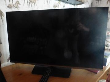 Samsung flatscreen-tv met afstandsbediening beschikbaar voor biedingen
