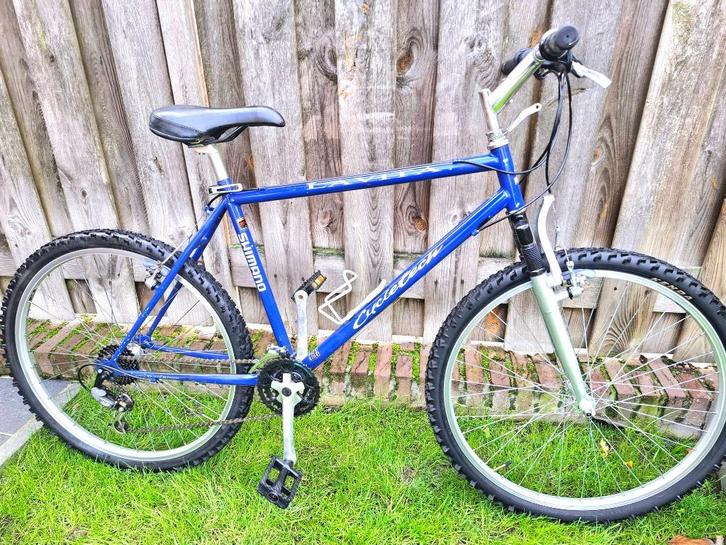 Blauwe mountainbike, met voorvering, 65,- euro, Fietsen en Brommers, Fietsen | Heren | Sportfietsen en Toerfietsen, Gebruikt, Meer dan 20 versnellingen