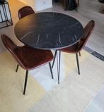 Gemarmerde zwarte ronde tafel, Ophalen