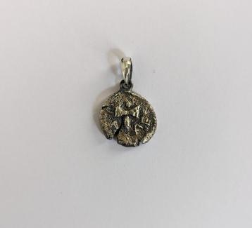 Hanger van de oude Griekse zilveren munt  