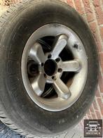 Complete set banden en velgen voor Mitsubishi Pajero > 1992, Gebruikt, Banden en Velgen, Ophalen of Verzenden, All Season