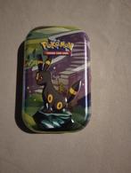 Umbreon tin van prismatic evolution., Hobby en Vrije tijd, Verzamelkaartspellen | Pokémon, Ophalen, Nieuw, Overige typen