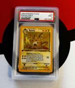 Pokémon - Fossil - Raichu Holo 1st edition - PSA9, Hobby en Vrije tijd, Ophalen of Verzenden, Zo goed als nieuw, Losse kaart