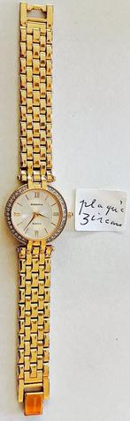 Montre dame RODANIA plaqué or "grain de riz" + 30 zircons, Collections, Enlèvement ou Envoi, Neuf