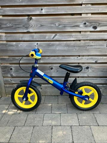 Loopfiets in goede staat beschikbaar voor biedingen