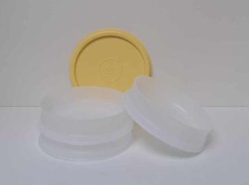 Tupperware « Stapelbare Igloo ronde » wit en geel beschikbaar voor biedingen