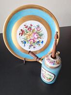 Chocoladekan met onderzetbord, Ophalen