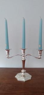 zilveren kandelaar, Ophalen