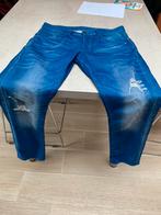 Jeans à trous We Fashion taille 34/32 en parfait état, Porté