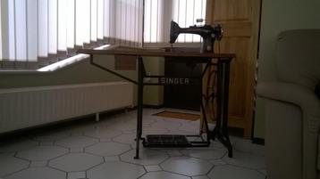 oude singer naaimachine, Enlèvement