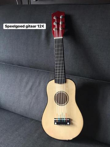 Houten speelgoed gitaar beschikbaar voor biedingen