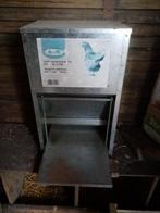 Trapvoederbak voor kippen ., Enlèvement