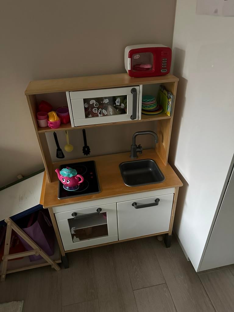 Speelgoedkeuken met toebehoren, Ophalen