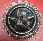 Broche exposition 1958, Collections