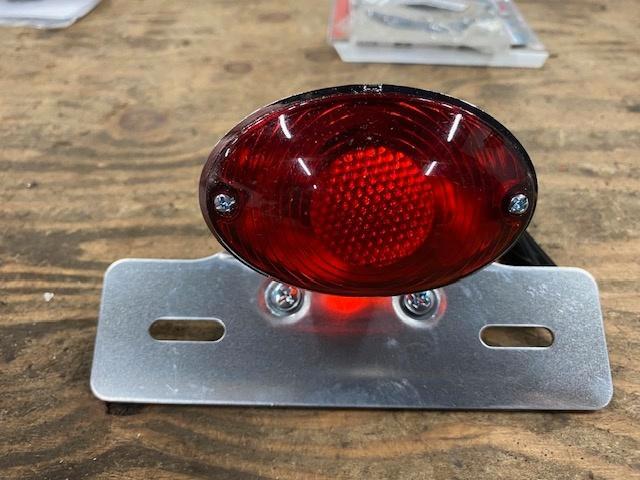Nieuw bromfiets achterlicht CAT eye, Fietsen en Brommers, Brommeronderdelen | Algemeen, Nieuw, Ophalen