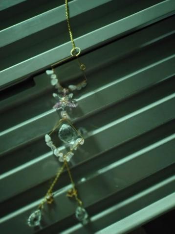 hanger wit kristal zonnetje en sterretjes  beschikbaar voor biedingen