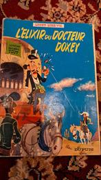 Het elixer van dokter Doxey - Lucky Luke nr. 7 - Paperback, Gelezen, Eén stripboek, Ophalen of Verzenden, Morris
