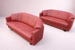 Set of two Leolux armchairs, upholstered in red leather., Huis en Inrichting, Ophalen of Verzenden, Gebruikt