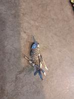 Zilveren broche (  zonder sluiting achteraan), Ophalen