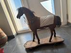 Cheval a bascule, Ophalen